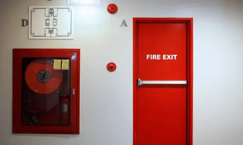 Fire exit door and emergency fire extinguisher